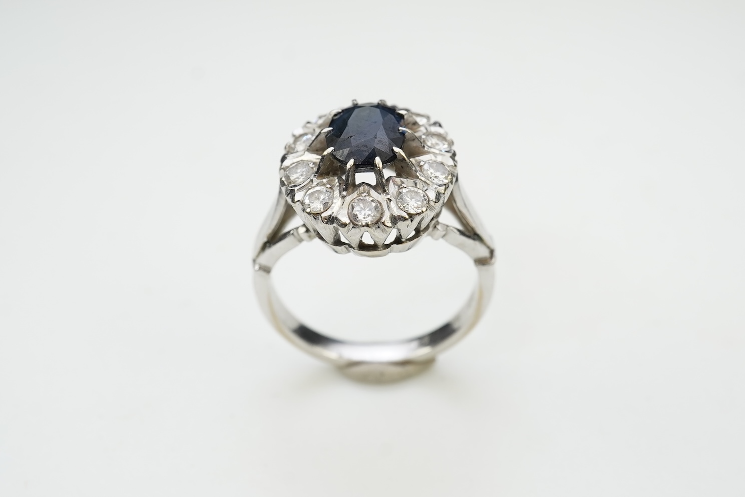 A sapphire and diamond cluster ring
